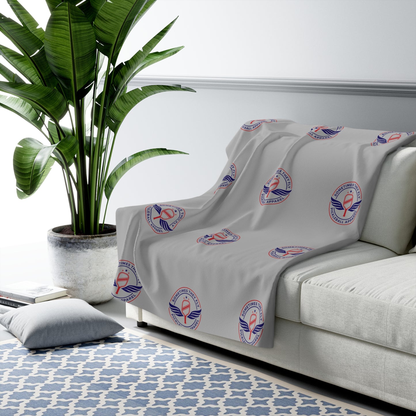 Sometimes they fly cozy Sherpa blanket on a couch