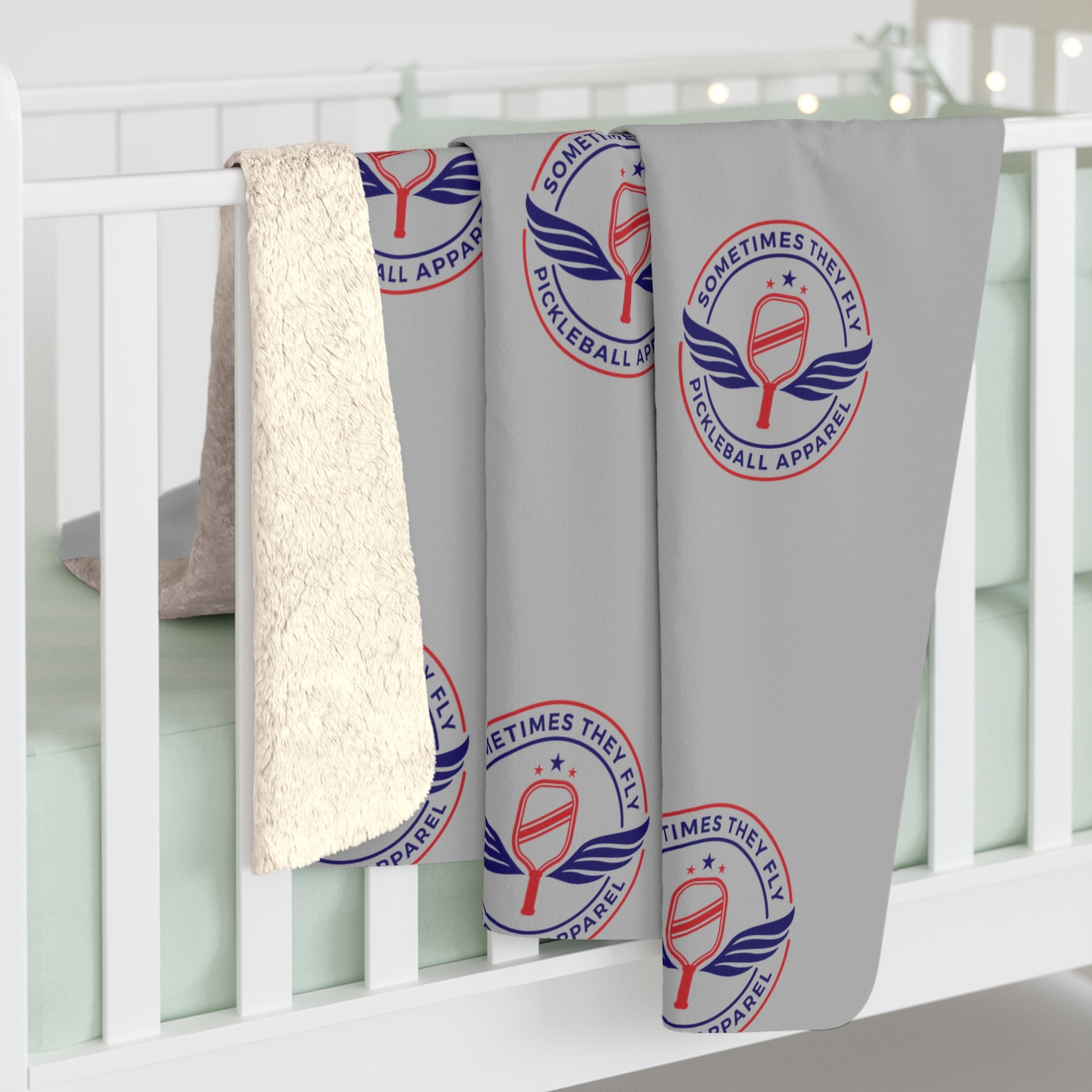Sometimes they fly cozy Sherpa blanket over a baby’s cradle 